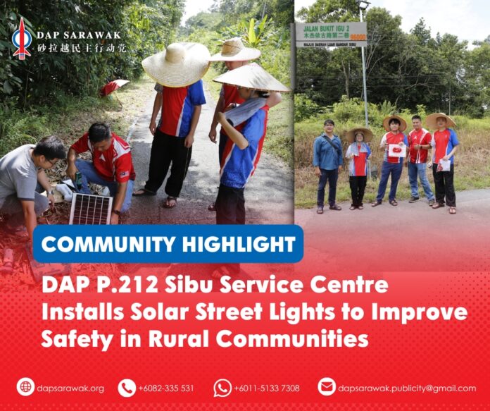 The DAP P.212 Sibu Service Centre team carries out the installation of solar street lights in Sibu's West Bank under a community initiative aimed at improving safety and visibility on poorly lit rural roads.